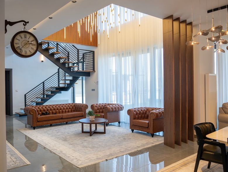 Сколько функциональных зон можно создать в гостиной 50-70 м²?